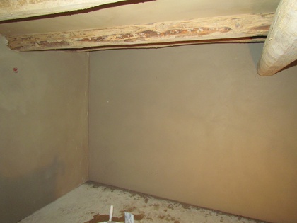 Die Kalkwand nach dem Abreiben hinten