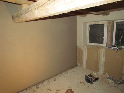 Die Kalkwand nach dem Abreiben vorne